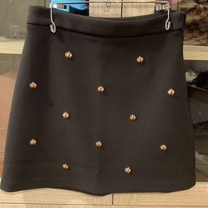 New without tags black maje mini skirt with gold detail